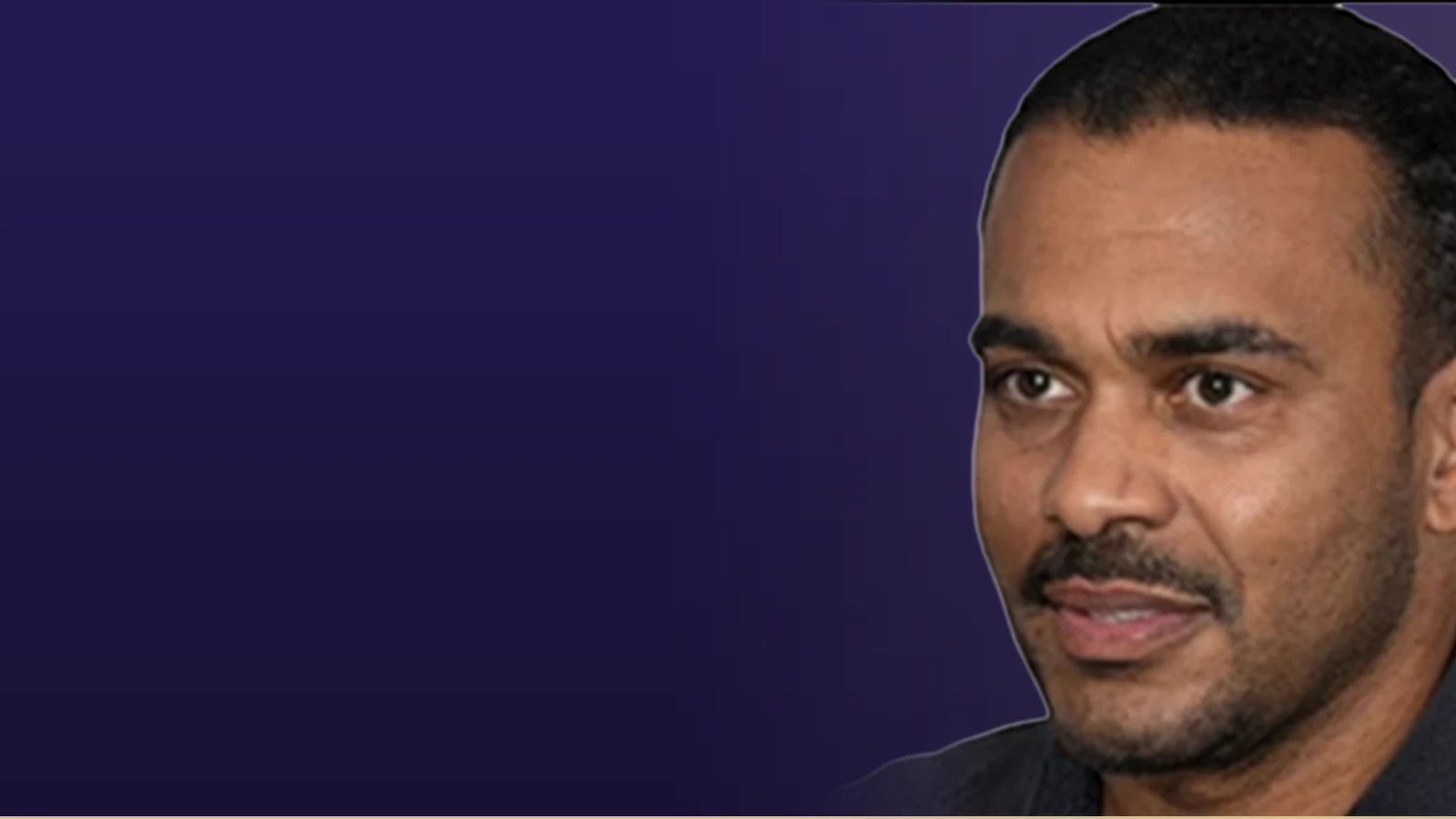 Russell Simmons headshot, a business professional with a purple backdrop.